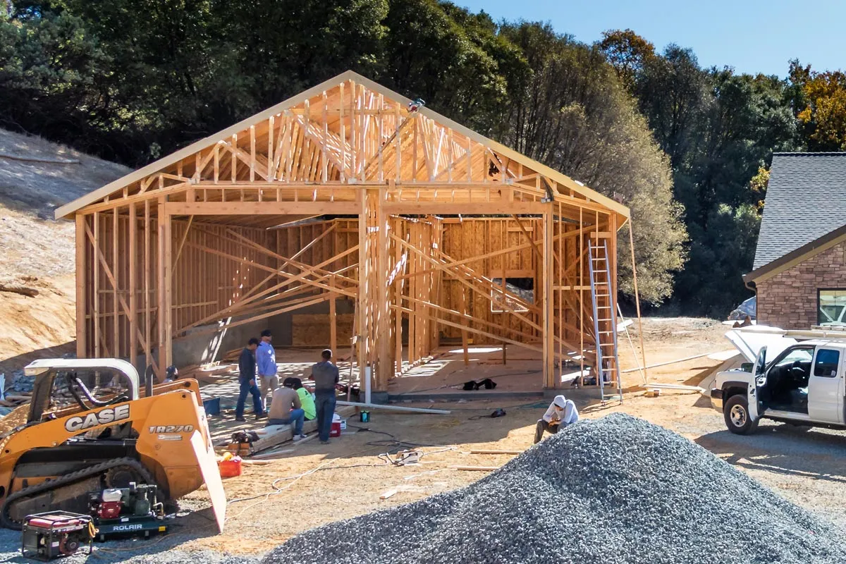 A barn-style shop built to the standard of the main house by Sherman Custom Homes